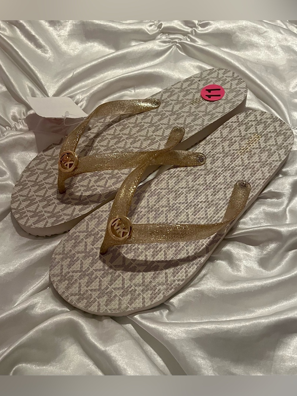 Michael kors vanilla/ gold glitter flip flops